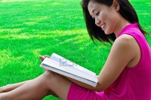 15641829-young-women-reading-a-book-in-t