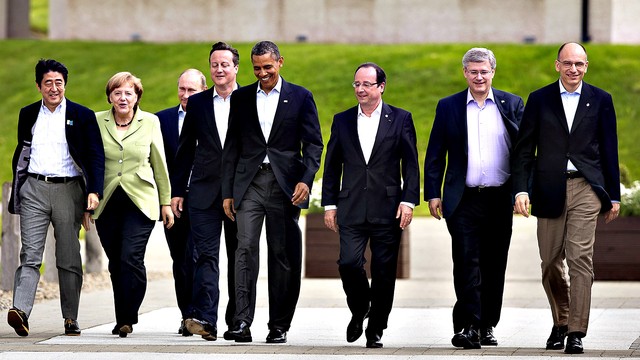 Tại hội nghị thượng đỉnh G8 ở bắc Ireland năm 2013, ông Putin cũng phải đối mặt với nhiều chỉ trích vì nhiều sự ủng hộ dành cho chế độ của Tổng thống Bashar al-Assad trong cuộc khủng hoảng ở Syria. Thủ tướng Canada Stephen Harper từng nói thẳng Tôi không nghĩ rằng chúng ta nên tự lừa phỉnh mình thêm nữa. Đây là G7 cộng 1. Hãy thẳng thắn đi, chuyện là: G7 cộng 1.